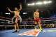 LAS VEGAS, NV - SEPTEMBER 15: Sergio Martinez (L) celebrates as Julio Cesar Chavez Jr. walks back to his corner after the eleventh round of their WBC middleweight title fight at the Thomas & Mack Center on September 15, 2012 in Las Vegas, Nevada. (Photo by Jeff Bottari/Getty Images)