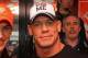 DAYTONA BEACH, FL - FEBRUARY 26: Joey Logano (L), driver of the #20 The Home Depot Toyota, poses with professional wrestler John Cena in the garage area prior to the start of the NASCAR Sprint Cup Series Daytona 500 at Daytona International Speedway on February 26, 2012 in Daytona Beach, Florida. (Photo by Matthew Stockman/Getty Images)