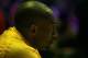 LOS ANGELES, CA - JANUARY 10: Kobe Bryant #24 of the Los Angeles Lakerssits on the bench during pregame introductions before the game with the Phoenix Suns at Staples Center on January 10, 2012 in Los Angeles, California. NOTE TO USER: User expressly acknowledges and agrees that, by downloading and or using this photograph, User is consenting to the terms and conditions of the Getty Images License Agreement. (Photo by Stephen Dunn/Getty Images)