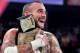 CM Punk celebrates after retaining the WWE Championship. (Photo credit: WWE.com)