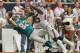 HOUSTON,TX - SEPTEMBER 09: Brian Hartline #82 of the Miami Dolphins completes a reception as he beats Kareem Jackson #25 of the Houston Texans on the play during the season opener at Reliant Stadium on September 9, 2012 in Houston, Texas. (Photo by Bob Levey/Getty Images)