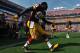 LANDOVER - SEPTEMBER 19: Brian Orakpo #98 of the Washington Redskins is introduced before the game against the Houston Texans at FedExField on September 19, 2010 in Landover, Maryland. The Texans defeated the Redskins in overtime 30-27. (Photo by Larry French/Getty Images)