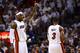 MIAMI, FL - JUNE 21: LeBron James #6 of the Miami Heat gestures on court in the first quarter next to teammate Dwyane Wade #3 against the Oklahoma City Thunder in Game Five of the 2012 NBA Finals on June 21, 2012 at American Airlines Arena in Miami, Florida. NOTE TO USER: User expressly acknowledges and agrees that, by downloading and or using this photograph, User is consenting to the terms and conditions of the Getty Images License Agreement. (Photo by Ronald Martinez/Getty Images)