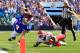 Sep 16, 2012; Orchard Park, NY, USA; Buffalo Bills quarterback Ryan Fitzpatrick (14) dives with the ball as Kansas City Chiefs defensive back Javier Arenas (21) tackles him during the second quarter at Ralph Wilson Stadium. Mandatory Credit: Kevin Hoffman-US PRESSWIRE