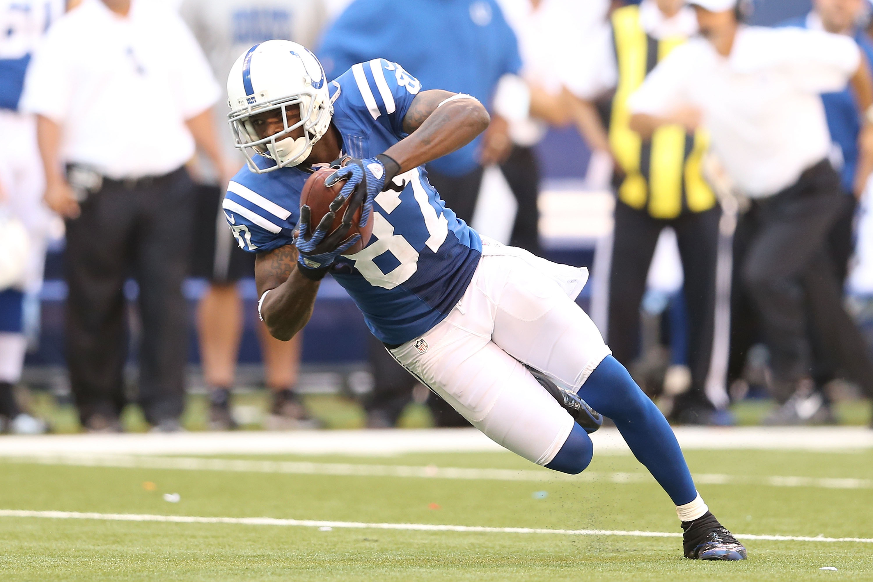 Indianapolis colts reggie wayne runs hi-res stock photography and