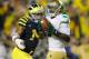 ANN ARBOR, MI - SEPTEMBER 10: Theo Riddick #6 of the Notre Dame Fighting Irish catchers a fourth quarter touchdown in front of Troy Woolfolk #29 of the Michigan Wolverines at Michigan Stadium on September 10, 2010 in Ann Arbor, Michigan. Michigan won the game 35-31. (Photo by Gregory Shamus/Getty Images)