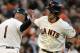 SAN FRANCISCO, CA - SEPTEMBER 09: Buster Posey #28 of the San Francisco Giants is congratulated by third base coach Tim Flannery #1 after Posey hit a solo home run in the six inning against the Los Angeles Dodgers at AT&T Park on September 9, 2012 in San Francisco, California. (Photo by Thearon W. Henderson/Getty Images)