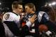 FOXBORO, MA - JANUARY 22: Tom Brady #12 of the New England Patriots talks with Joe Flacco #5 of the Baltimore Ravens after defeating the Baltimore Ravens in the AFC Championship Game at Gillette Stadium on January 22, 2012 in Foxboro, Massachusetts. The New England Patriots defeated the Baltimore Ravens 20-23. (Photo by Al Bello/Getty Images)
