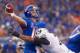BOISE, ID - SEPTEMBER 20: Joe Southwick #16 of the Boise State Broncos throws just ahead of a hit by Preston Hadley #7 of the BYU Cougars at Bronco Stadium on September 20, 2012 in Boise, Idaho. (Photo by Otto Kitsinger III/Getty Images)