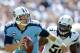 SAN DIEGO, CA - SEPTEMBER 16: Jake Locker #10 of the Tennessee Titans scrambles out of the pocket from Donald Butler #56 of the San Diego Chargers at Qualcomm Stadium on September 16, 2012 in San Diego, California. (Photo by Harry How/Getty Images)