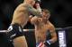 Jun 22, 2012; Atlantic City, NJ, USA; Cub Swanson (right) fights Ross Pearson in a featherweight bout during UFC on FX at Revel Resort and Casino. Cub Swanson won the fight by technical knockout in the second round. Mandatory Credit: Joe Camporeale-US PRESSWIRE