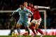 MANCHESTER, ENGLAND - DECEMBER 18: Mikel Arteta of Arsenal competes with Sergio Aguero of Manchester City during the Barclays Premier League match between Manchester City and Arsenal at the Etihad Stadium on December 18, 2011 in Manchester, England. (Photo by Clive Brunskill/Getty Images)