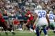 ARLINGTON, TX - SEPTEMBER 23: Josh Freeman #5 of the Tampa Bay Buccaneers throws the ball against the Dallas Cowboys at Cowboys Stadium on September 23, 2012 in Arlington, Texas. (Photo by Ronald Martinez/Getty Images)
