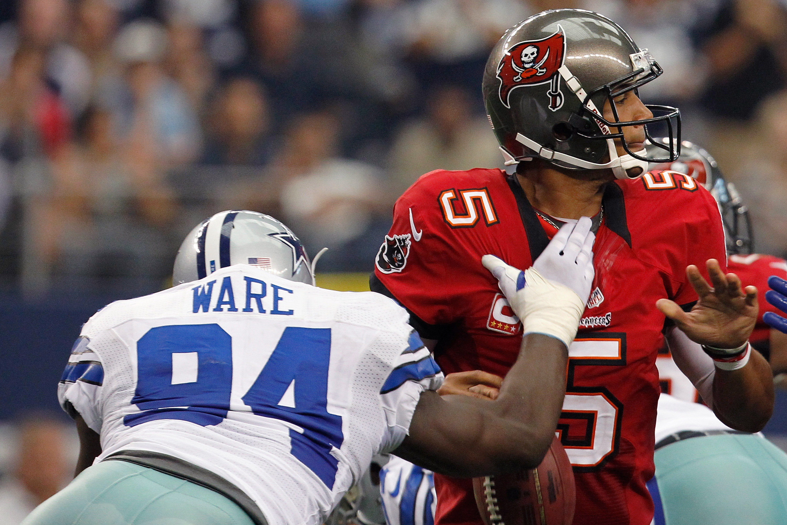 WATCH: Furious Cowboys supporters jump a fan following their defeat to  Buccaneers