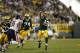 GREEN BAY, WI - SEPTEMBER 13: Aaron Rodgers #12 of the Green Bay Packers throws a pass against the Chicago Bears during the game at Lambeau Field on September 13, 2012 in Green Bay, Wisconsin. (Photo by Joe Robbins/Getty Images)