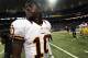 ST LOUIS, MO - SEPTEMBER 16: Quarterback Robert Griffin III #10 of the Washington Redskins walks off the field after the Redskins were defeated by the St Louis Rams 31-28 in the game against the St. Louis Rams at Edward Jones Dome on September 16, 2012 in St Louis, Missouri. (Photo by Jamie Squire/Getty Images)