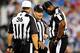 CHARLOTTE, NC - SEPTEMBER 20: Replacement officials Robert Frazer #36, John Vachon #123, and Lemuel Hawkins #47 confer after throwing a penalty flag during a game between the New York Giants and the Carolina Panthers at Bank of America Stadium on September 20, 2012 in Charlotte, North Carolina. The Giants won 36-7. (Photo by Grant Halverson/Getty Images)