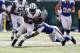 EAST RUTHERFORD, NJ - SEPTEMBER 09: Bilal Powell #29 of the New York Jets tries to break tackle of Nick Barnett #50 of the Buffalo Bills during their season opener at MetLife Stadium on September 9, 2012 in East Rutherford, New Jersey. (Photo by Jeff Zelevansky/Getty Images)