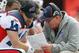 KANSAS CITY, MO - OCTOBER 31: Head coach Chan Gailey of the Buffalo Bills talks on the sidelines with quarterback Ryan Fitzpatrick #14 during the game against the Kansas City Chiefs on October 31, 2010 at Arrowhead Stadium in Kansas City, Missouri. (Photo by Jamie Squire/Getty Images)