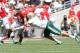 COLUMBUS, OH - SEPTEMBER 22: Devin Smith #15 of the Ohio State Buckeyes is tackled by Jake Ganus #4 of the University of Alabama at Birmingham Blazers during the second quarter on September 22, 2012 at Ohio Stadium in Columbus, Ohio. (Photo by Kirk Irwin/Getty Images)