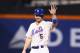 NEW YORK, NY - SEPTEMBER 26: David Wright #5 of the New York Mets waves to the crowd after passing Ed Kranepool as the New York Mets all time hits leader with 1419 during the third inning outfield their game on September 26, 2012 at Citi Field in the Flushing neighborhood of the Queens borough of New York City. (Photo by Al Bello/Getty Images)