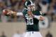 EAST LANSING, MI - SEPTEMBER 15: Andrew Maxwell #10 of the Michigan State Spartans throws a first quarter pass while playing the Notre Dame Fighting Irish at Spartan Stadium Stadium on September 15, 2012 in East Lansing, Michigan. (Photo by Gregory Shamus/Getty Images)