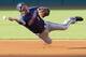 CLEVELAND, OH - AUGUST 6: Second baseman Tsuyoshi Nishioka #1 of the Minnesota Twins slips and falls as he tries to throw to first during the first inning against the Cleveland Indians at Progressive Field on August 6, 2012 in Cleveland, Ohio. (Photo by Jason Miller/Getty Images)