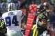 SEATTLE, WA - SEPTEMBER 16: Quarterback Russell Wilson #3 of the Seattle Seahawks passes the ball as DeMarcus Ware #94 of the Dallas Cowboys rushes during a game at CenturyLink Field on September 16, 2012 in Seattle, Washington. Seattle won the game 27-7. (Photo by Stephen Brashear/Getty Images)