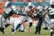 MIAMI GARDENS, FL - SEPTEMBER 23: Daniel Thomas #33 of the Miami Dolphins runs with the ball against the New York Jets on September 23, 2012 at Sun Life Stadium in Miami Gardens, Florida. The Jets defeated the Dolphins 23-20 in overtime. (Photo by Joel Auerbach/Getty Images)
