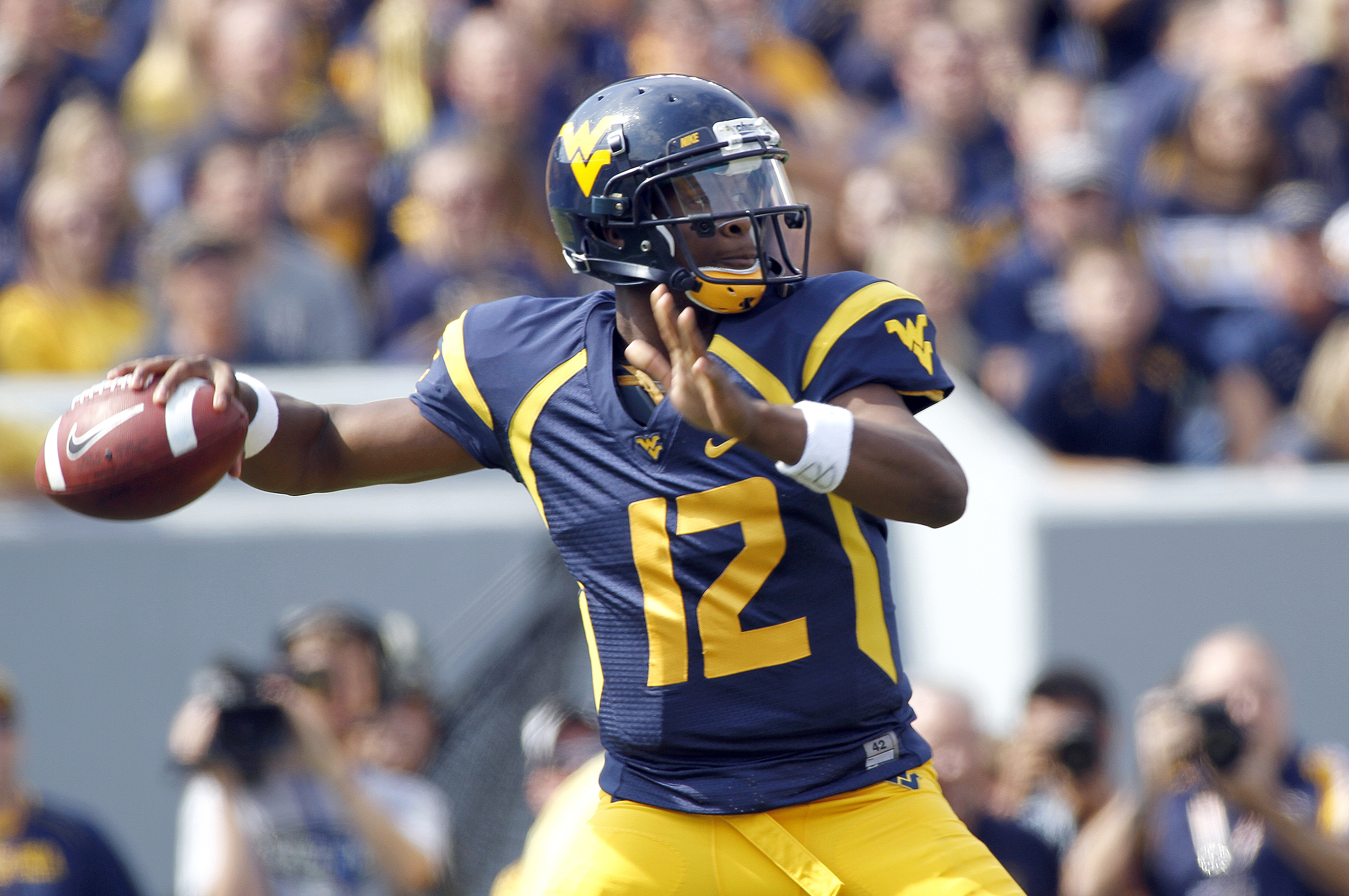 Geno Smith, Tavon Austin highlight West Virginia's all-decade