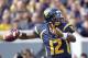 MORGANTOWN, WV - SEPTEMBER 29: Geno Smith #12 of the West Virginia Mountaineers drops back to pass against the Baylor Bears during the game on September 29, 2012 at Mountaineer Field in Morgantown, West Virginia. (Photo by Justin K. Aller/Getty Images)