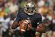 SOUTH BEND, IN - SEPTEMBER 08: Everett Golson #5 of the Notre Dame Fighting Irish rolls out to look for a receiver against the Purdue Boilermakers at Notre Dame Stadium on September 8, 2012 in South Bend, Indiana. Notre Dame defeated Purdue 21-17. (Photo by Jonathan Daniel/Getty Images)