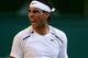 LONDON, ENGLAND - JUNE 28: Rafael Nadal in reacts during his Gentlemen's Singles second round match against Lukas Rosol of the Czech Republic on day four of the Wimbledon Lawn Tennis Championships at the All England Lawn Tennis and Croquet Club on June 28, 2012 in London, England. (Photo by Clive Rose/Getty Images)