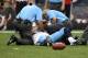 September 30, 2012; Houston, TX, USA; Medical staff attends to Tennessee Titans quarterback Jake Locker (10) during the first quarter against the Houston Texans at Reliant Stadium. Mandatory Credit: Troy Taormina-US PRESSWIRE