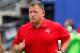 Sep 16, 2012; East Rutherford, NJ, USA; Tampa Bay Buccaneers head coach Greg Schiano runs onto the field prior to the game against the New York Giants at MetLife Stadium. Mandatory Credit: Jim O'Connor-US PRESSWIRE