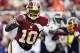 Sept. 30, 2012; Tampa FL, USA; Washington Redskins quarterback Robert Griffin III (10) pitches the ball against the Tampa Bay Buccaneers during the second half at Raymond James Stadium. Washington defeated Tampa Bay 24-22. Mandatory Credit: Matt Stamey-US PRESSWIRE