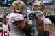Sept 30, 2012; East Rutherford, NJ, USA; San Francisco 49ers quarterback Colin Kaepernick (7) and San Francisco 49ers guard Alex Boone (75) celebrate Kaepernick's touchdown run during the first half of their game against the New York Jets at MetLIfe Stadium. Mandatory Credit: Ed Mulholland-US PRESSWIRE
