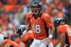 DENVER, CO - SEPTEMBER 30: Quarterback Peyton Manning #18 of the Denver Broncos directs the offense against the Oakland Raiders at Sports Authority Field at Mile High on September 30, 2012 in Denver, Colorado. The Broncos defeated the Raiders 37-6. (Photo by Doug Pensinger/Getty Images)