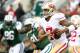 Sept. 30, 2012; East Rutherford, NJ, USA; San Francisco 49ers quarterback Colin Kaepernick (7) runs with the ball during the first quarter against the New York Jets at MetLife Stadium. Mandatory Credit: Debby Wong-US PRESSWIRE