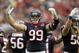 Sep 30, 2012; Houston, TX, USA; Houston Texans defensive end J.J. Watt (99) shows emotion against the Tennessee Titans in the second quarter at Reliant Stadium. Mandatory Credit: Brett Davis-US PRESSWIRE