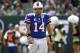 EAST RUTHERFORD, NJ - SEPTEMBER 09: Ryan Fitzpatrick #14 of the Buffalo Bills looks for an open man against the New York Jets during their game at MetLife Stadium on September 9, 2012 in East Rutherford, New Jersey. (Photo by Jeff Zelevansky/Getty Images)