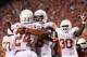 STILLWATER, OK - SEPTEMBER 29: Running back Joe Bergeron #24 and tight end D.J. Grant #18 of the Texas Longhorns celebrate a touchdown against the Texas Longhorns on September 29, 2012 at Boone Pickens Stadium in Stillwater, Oklahoma. Texas defeated Oklahoma State 41-36. (Photo by Brett Deering/Getty Images)