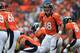 DENVER, CO - SEPTEMBER 30: Quarterback Peyton Manning #18 of the Denver Broncos directs the offense against the Oakland Raiders at Sports Authority Field at Mile High on September 30, 2012 in Denver, Colorado. The Broncos defeated the Raiders 37-6. (Photo by Doug Pensinger/Getty Images)
