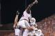 STILLWATER, OK - SEPTEMBER 29: Running back Joe Bergeron #24 and guard Mason Walters #72 of the Texas Longhorns celebrate a touchdown against the Oklahoma State Cowboys on September 29, 2012 at Boone Pickens Stadium in Stillwater, Oklahoma. Texas defeated Oklahoma State 41-36. (Photo by Brett Deering/Getty Images)
