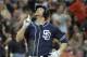 SAN DIEGO, CA - SEPTEMBER 29: Chase Headley #7 of the San Diego Padres points skyward after he hit a two-run homer during the third inning of a baseball game against the San Francisco Giants at Petco Park on September 29, 2012 in San Diego, California. (Photo by Denis Poroy/Getty Images)