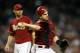 PHOENIX, AZ - OCTOBER 03: Catcher Miguel Montero #26 of the Arizona Diamondbacks fields a ground ball out against the Colorado Rockies during the MLB game at Chase Field on October 3, 2012 in Phoenix, Arizona. (Photo by Christian Petersen/Getty Images)