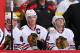 GLENDALE, AZ - APRIL 14: (L-R) Marian Hossa #81, Jonathan Toews #19 and Patrick Kane #88 of the Chicago Blackhawks watch from the bench in Game Two of the Western Conference Quarterfinals against the Phoenix Coyotes during the 2012 NHL Stanley Cup Playoffs at Jobing.com Arena on April 14, 2012 in Glendale, Arizona. The Blackhawks defeated the Coyotes 4-3 in overtime. (Photo by Christian Petersen/Getty Images)