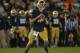 SOUTH BEND, IN - SEPTEMBER 22: Tommy Rees #11 of the Notre Dame Fighting Irish looks for a receiver against the Michigan Wolverines at Notre Dame Stadium on September 22, 2012 in South Bend, Indiana. Notre Dame defeated Michigan 13-6. (Photo by Jonathan Daniel/Getty Images)