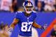 EAST RUTHERFORD, NJ - SEPTEMBER 05: wide receiver Domenik Hixon #87 of the New York Giants reacts after a catch in the third quarter against the Dallas Cowboys during the 2012 NFL season opener at MetLife Stadium on September 5, 2012 in East Rutherford, New Jersey. (Photo by Al Bello/Getty Images)