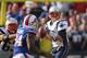 ORCHARD PARK, NY - SEPTEMBER 30: Tom Brady #12 of the New England Patriots looks to pass against the Buffalo Bills at Ralph Wilson Stadium on September 30, 2012 in Orchard Park, New York.New England won 52-28. (Photo by Rick Stewart/Getty Images)